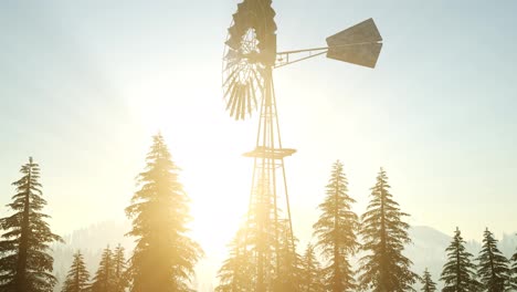 Typische-Alte-Windmühlenturbine-Im-Wald-Bei-Sonnenuntergang